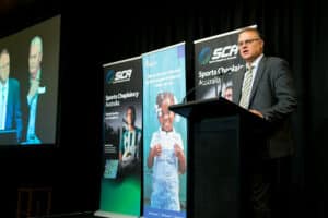 Trevor presenting at the ACS Financial compassion sports award evening event.