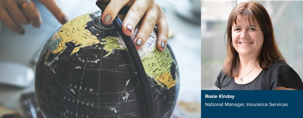 Hands pointing to a world globe next to Rosie Kinday portrait, highlighting overseas travel planning.