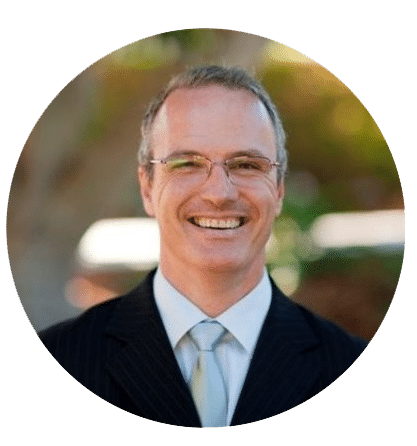 school3 Greg Morris, Head of Operations at Oxford Falls Grammar School, smiling in a suit, representing ACS Financial's commitment to providing tailored financial solutions for schools and businesses.