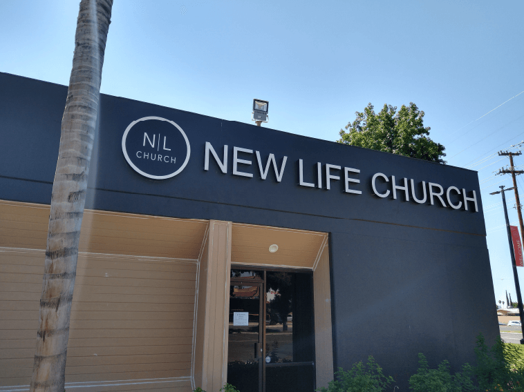 New Life Church building exterior entrance, illustrating accurate property replacement cost evaluations.