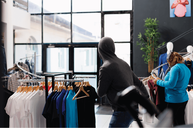 Mannequin clothing displays inside a thrift store, highlighting risk management for running a safe church op shop.