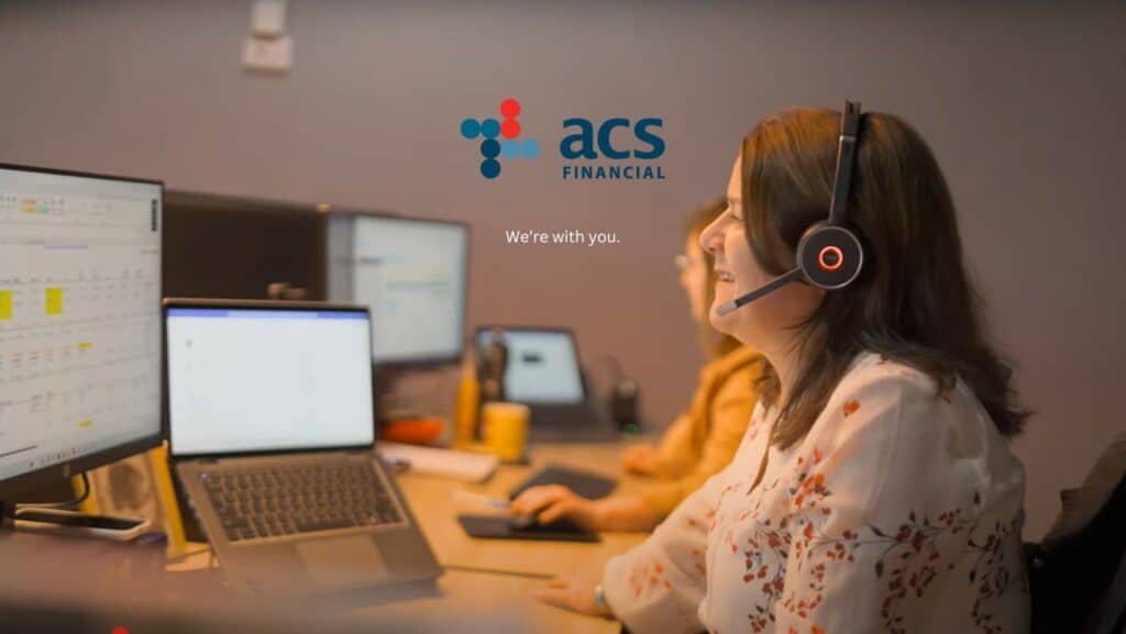 ACS Financial customer service specialists with headsets handling ministry insurance client support calls.