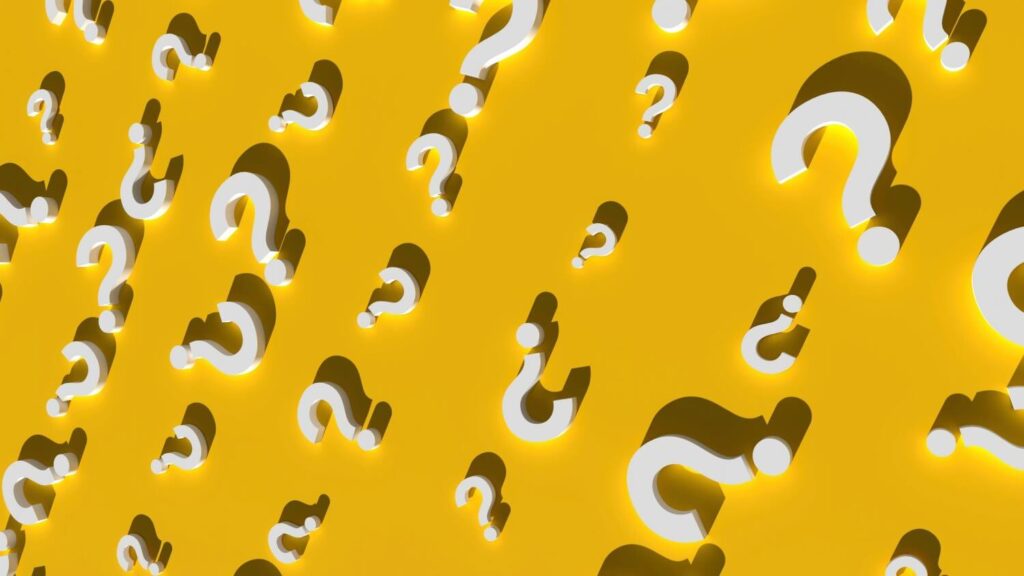Pattern of 3D question marks on a yellow backdrop, signifying questions regarding aged care insurance pricing.