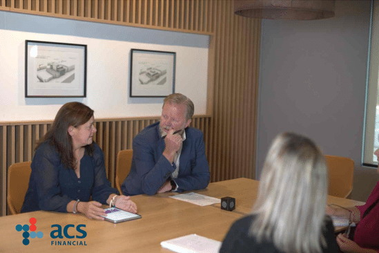 ACS Financial advisory team consulting on corporate strategy and competitive benefits of aged care insurance packages.